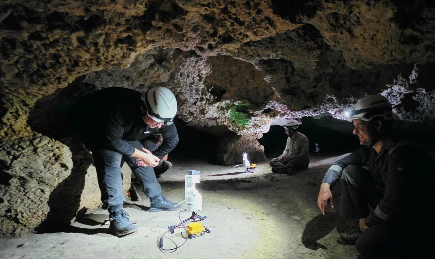 Team using the LiDAR sensor in the cave